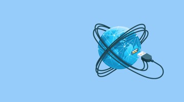 Terre bleue entourée de câbles réseau, avec une connexion USB insérée dans l'un des câbles.